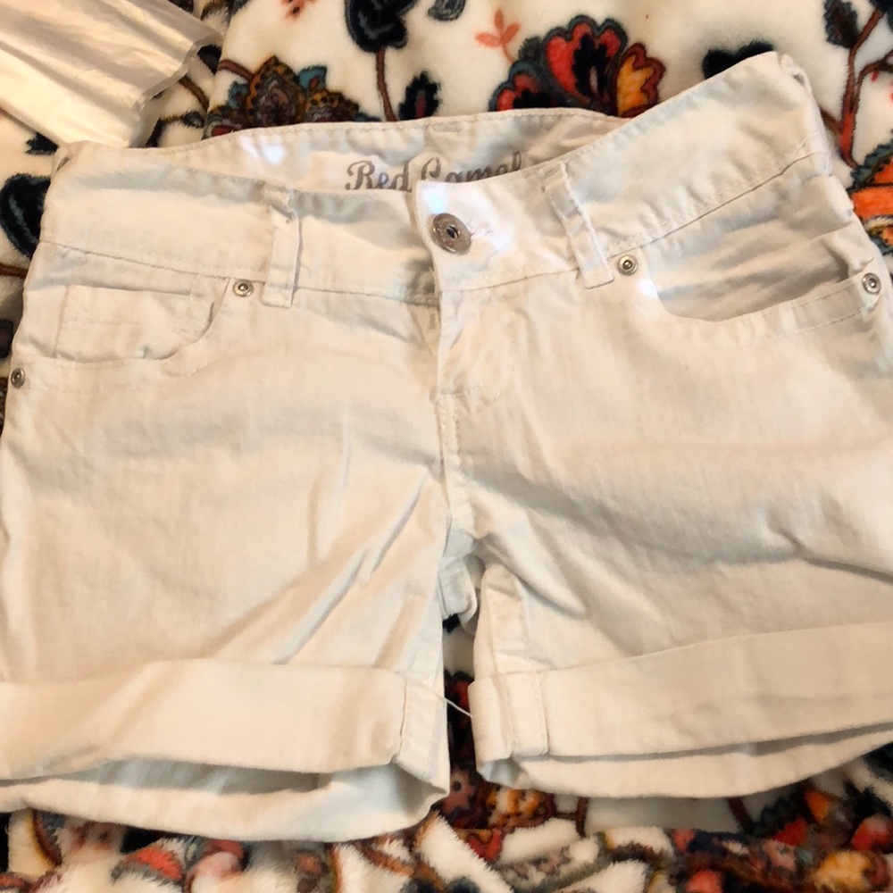 White cuffed shorts.